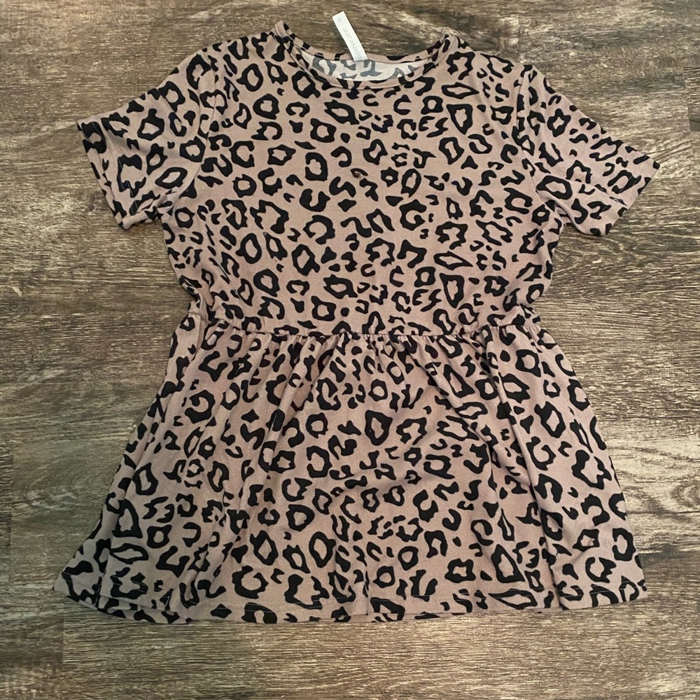 Tickled Teal peplum leopard top